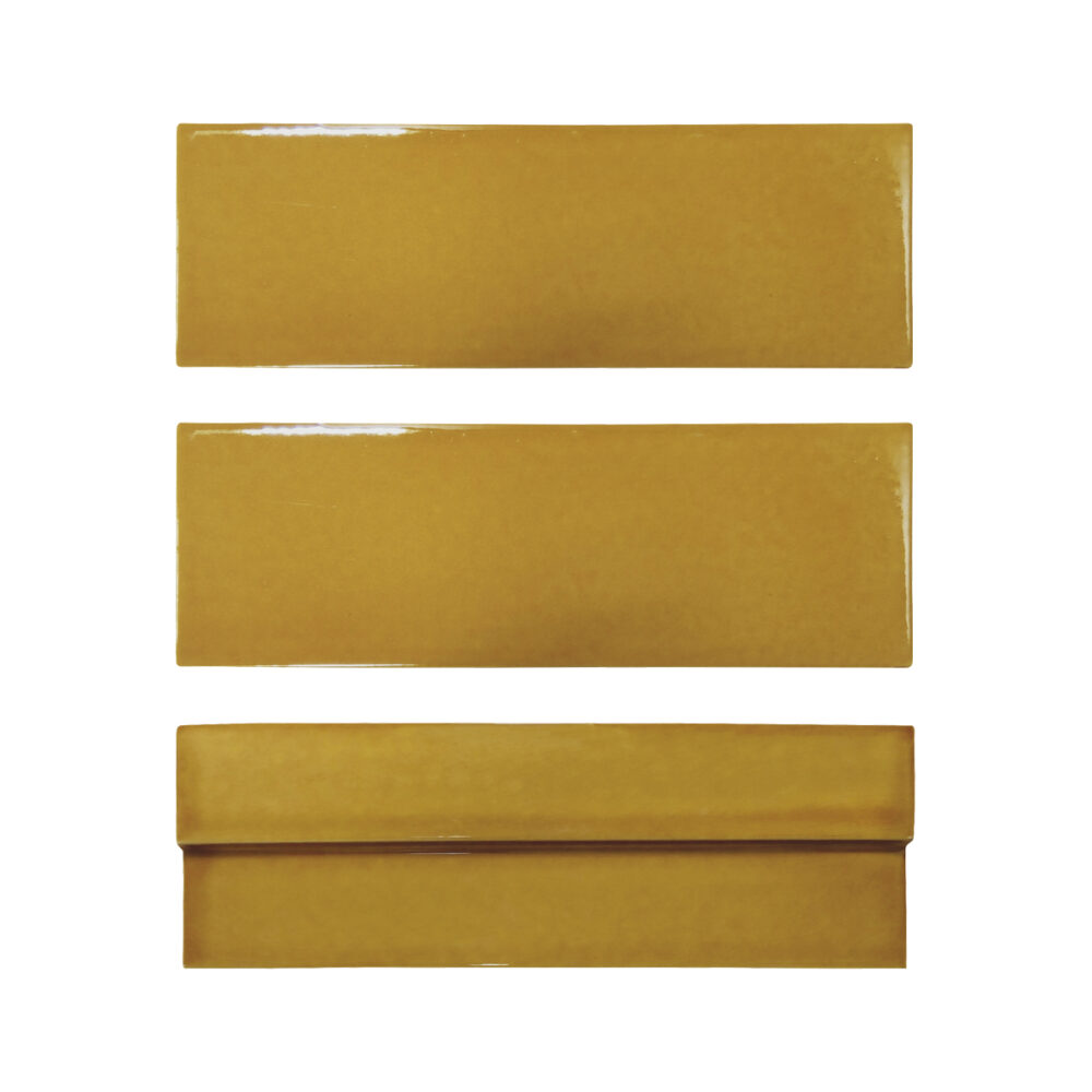 A set of three gold envelopes with different designs.