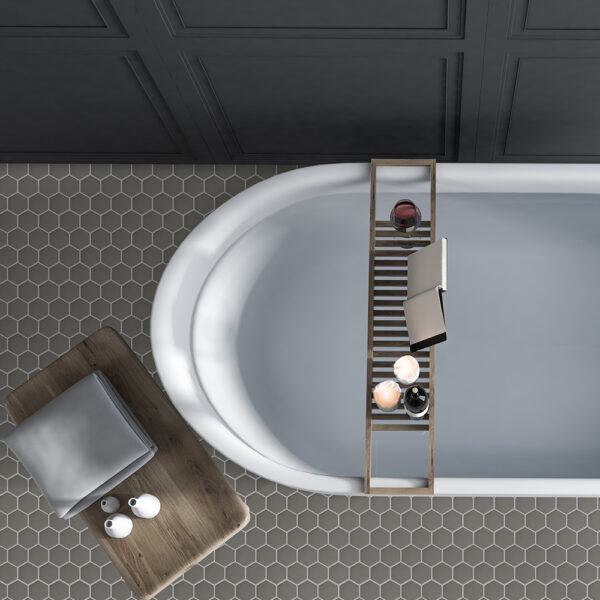 A bathroom with a tub and a wooden tray