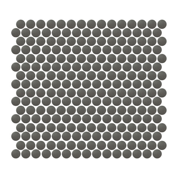 A gray tile floor with small circles on it.