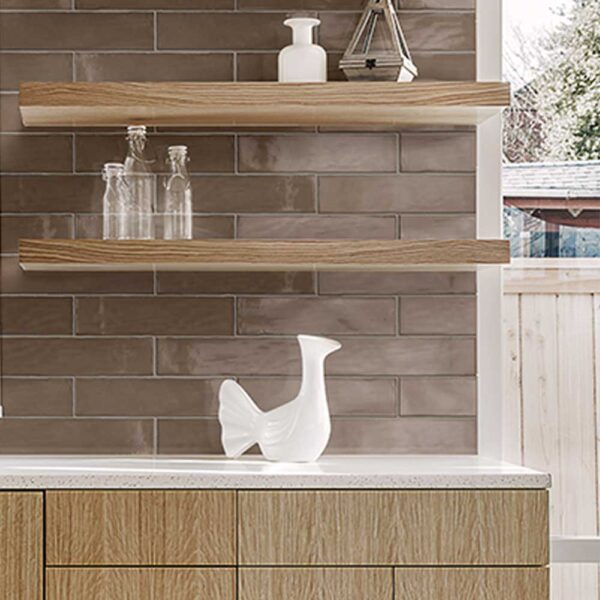 A white bird figurine sitting on top of a counter.