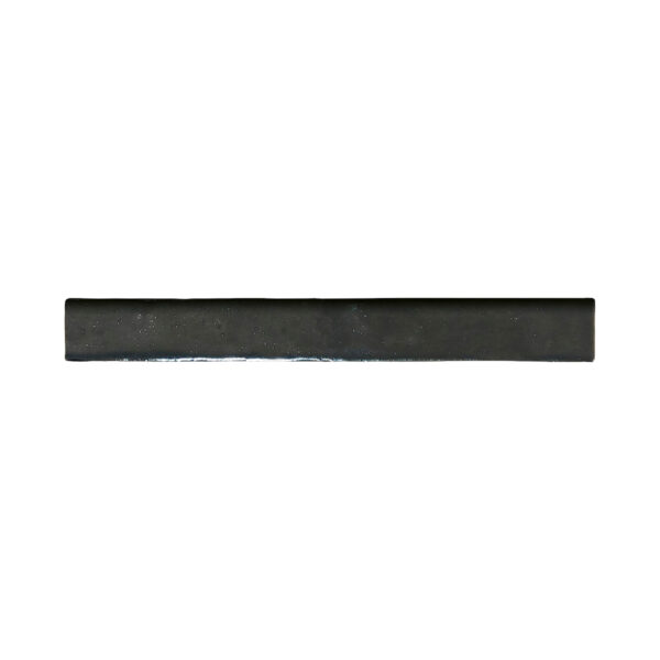 A black strip of rubber is sitting on top of the floor.