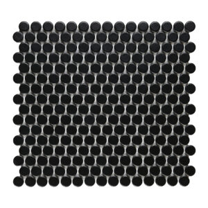 A black tile floor with small circles on it