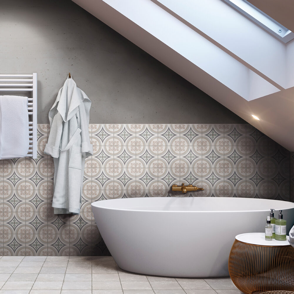 A bathroom with a tub and towels on the wall.