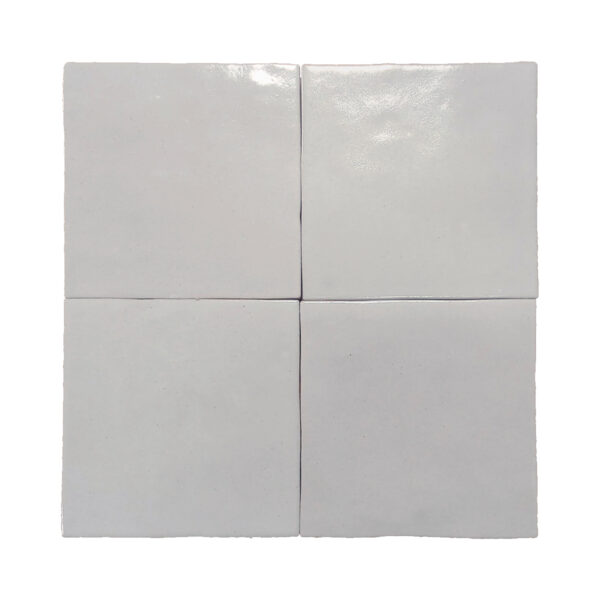 A white tile floor with four squares of each size.