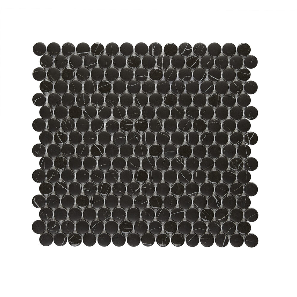 A black tile with small circles on it.