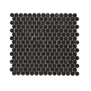 A black tile with small circles on it.