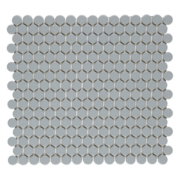 A gray tile floor with circles on it.