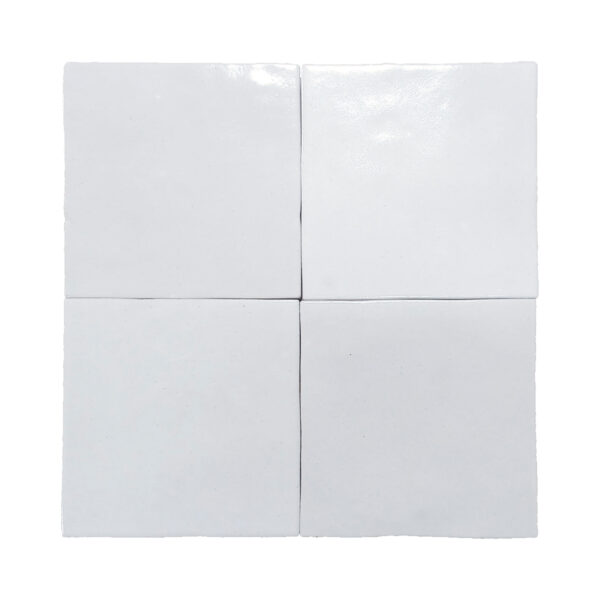 A white tile floor with four squares of each size.