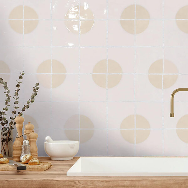 A kitchen counter with a sink and some vases