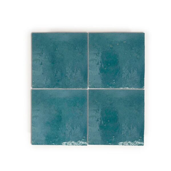 A square tile with four different colors of tiles.