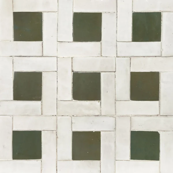 A white and green tile floor with squares